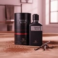 Grandeur Tribal Blue Man by Grandeur 100ml EDP Men — Black perfume bottle and cylindrical box with water droplets, set on sand with cocoa powder and vanilla pods.