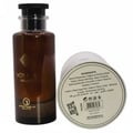 Grandeur Voyage Exclusif by Grandeur Elite – 100 ml for Men, featuring the amber glass bottle and its white cylindrical packaging with ingredients list.