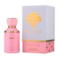 Gulf Orchid Sunset Kiss — Pink perfume bottle with gold accents and a matching box featuring a gold sunset design.