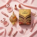Khadlaj Hareem Al Sultan Gold by Khadlaj 35ml — Ornate gold perfume bottle with red gems, gold-accented makeup, and product box arranged on pink satin.