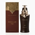 Khadlaj Stellar Oud by Khadlaj 100ml EDP Man — Botol minyak wangi coklat gelap dengan penutup dan aksen emas, bersebelahan kotak corak coklat gelap dan emas yang sepadan, berlatar belakang putih.