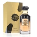 Lattafa Awraq Al Oud — Gold box and dark glass perfume bottle with gold accents and black cap, white background
