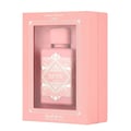Lattafa Badee Al Oud Noble Blush — Pink perfume bottle in a pink box with ornate silver geometric design and Arabic text.