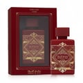 Lattafa Badee Al Oud Sublime — Red perfume box with window showing bottle, and a separate bottle with gold geometric design.
