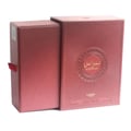 Lattafa Pride Nebras — Red textured box with a sliding sleeve, featuring a sunburst design and gold Arabic text.