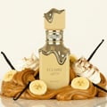 Lattafa Eclaire Banoffi — Perfume bottle surrounded by caramel, whipped cream, banana slices, and vanilla beans.