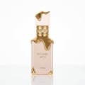Lattafa Eclaire — A pale pink perfume bottle with gold dripping accents and a gold ridged collar, against a white background.