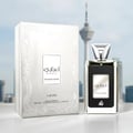 Lattafa Ejaazi Intensive – White embossed box and silver-accented black perfume bottle with city skyline background