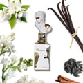 Lattafa Her Confession by Lattafa 100ml EDP — Perfume bottle with a bust sculpture cap, surrounded by jasmine flowers, vanilla pods, tonka beans, and cinnamon sticks.
