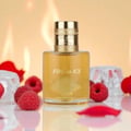 Lattafa Fire On Ice by Lattafa 100ml EDP Unisex — Botol minyak wangi kaca jernih berisi cecair keemasan, dengan penutup emas. Dikelilingi buah raspberi segar, kelopak merah, dan ketulan ais.