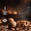 Lattafa Pride Hala by Lattafa – 100 ml Eau de Parfum for Men, a dark brown wooden perfume bottle with a silver cap and a white label, next to a walnut and a pile of wood chips with smoke rising