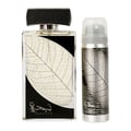 Lattafa Najdia by Lattafa – 100 ml for Men, featuring a clear glass perfume bottle with a black label showcasing a white leaf skeleton design and a silver spray bottle with a matching design.