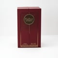 Lattafa Sakeena by Lattafa 100ml EDP Women — A maroon gift box with gold accents, featuring the brand name 'Sakeena' in Arabic and English on a circular emblem.
