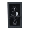 Lattafa Maahir Black Edition by Lattafa 100ml for Men — Black glass perfume bottle with ornate horse head cap, tied with a black ribbon, presented in a black gift box.