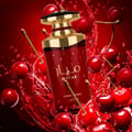Lattafa Mayar Cherry Intense Lattafa 100ml EDP — Red perfume bottle with gold cap surrounded by splashing red liquid and fresh cherries.