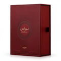 Lattafa Pride Nebras — Red embossed box with sunburst pattern and circular emblem featuring Arabic script and 'NEBRAS' text, Lattafa Pride logo, and volume details.