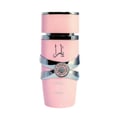 Lattafa Yara by Lattafa 100ml EDP Women — Botol minyak wangi merah jambu dengan perincian perak dan tulisan Arab, menampilkan reben perak hiasan di bahagian tengah.