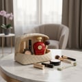 Lattafa Opulent Red by Lattafa 100ml Unisex — A red perfume bottle with a gold cap and intricate design sits inside a quilted beige makeup bag, surrounded by makeup brushes, lipstick, and a jade roller on a marble table.
