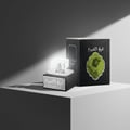 Lattafa Sheikh Al Shuyukh by Lattafa 50ml EDP Men — Black perfume bottle with a clear cap and silver base, next to its black textured box with a green circular design featuring a man's profile.