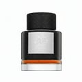 Lattafa Qaaed Intense by Lattafa 100ml EDP — Botol minyak wangi hitam bertekstur dengan label perak tertulis skrip Arab dan teks 'Qaaed Intense Lattafa'. Penutupnya hitam dan bertekstur, manakala cecair di dalamnya berwarna ambar.