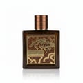 Lattafa Qaed Al Fursan Untamed Lattafa 90ml EDP — A square brown glass perfume bottle with a metallic gold label featuring a horse illustration and Arabic text, topped with a ribbed copper cap.
