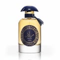 Lattafa Raed Luxe by Lattafa 100ml EDP Unisex — Botol minyak wangi kaca jernih berisi cecair keemasan, penutup biru gelap, dan label biru gelap dengan kaligrafi Arab emas serta tulisan 'RA'ED Lattafa'.
