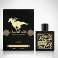 Lattafa Qaed Al Fursan 90ml Lelaki — Kotak minyak wangi hitam dengan siluet kuda emas dan corak berhias, bersebelahan botol minyak wangi hitam berlabel emas menampilkan kuda dan tulisan Arab.