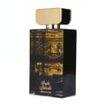 Lattafa Qasaed Al Sultan — Black glass perfume bottle with ornate gold Arabic script and imagery, featuring a prominent gold cap, isolated on a white background.