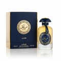 Lattafa Raed Luxe by Lattafa 100ml EDP Unisex — Kotak biru navy dan emas diletakkan bersebelahan botol minyak wangi kaca jernih berisi cecair kuning dan penutup biru navy, dengan lambang bulat emas.