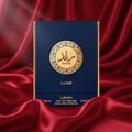 Lattafa Raed Luxe by Lattafa 100ml EDP Unisex — Kotak minyak wangi biru navy dengan lambang bulat emas bertulis skrip Arab dan 'RA'ED', berlatarbelakangkan kain satin merah yang mewah.