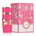Lattafa Yara Candy by Lattafa 100ml EDP Women — Botol minyak wangi merah jambu dengan perincian emas dan kotak bercorak bunga merah jambu, dipaparkan bersama.