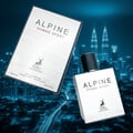 Maison Alhambra Alpine Homme Sport — White perfume box and bottle with black cap, set against a blurred night cityscape with illuminated skyscrapers and light trails from traffic.