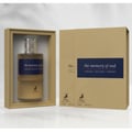 Maison Alhambra The Memory Of Oud EDP 100ml — A gold-framed box displays a clear glass perfume bottle with a navy blue label. The matching outer box is also shown.