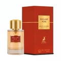 Maison Alhambra Exclusif Rose — A clear glass perfume bottle with a gold cap and a red label, placed next to its matching red and gold box.