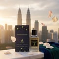 Maison Alhambra Extravagant Lover by Maison Alhambra – 100 ml bottle and box displayed with rose petals and city skyline background.