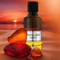 Maison Alhambra Fortnight by Maison Alhambra 100ml EDP Men — Amber-colored stones and a glass perfume bottle with a black cap, set against a desert sunset background.