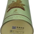 Maison Alhambra Glacier Bella EDP 100ml Women Perfume — Close-up of a tall, light green perfume can with gold accents, featuring a floral design and brand text.