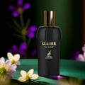 Maison Alhambra Glacier Le Noir by Maison Alhambra 100ml Men — Black perfume bottle with gold accents and deer logo, set against a dark green background with purple and white flowers.
