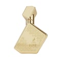 Maison Alhambra Luxe Gold – Botol minyak wangi emas dengan penutup geometri, menampilkan logo rusa dan corak bulat pada badannya.