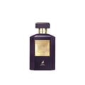 Maison Alhambra Infini Intoxicating Cherry — A dark purple, faceted perfume bottle with a gold cap and gold label featuring the brand's deer logo.