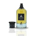 Maison Alhambra Jean Lowe Fraiche — Yellow liquid perfume bottle with black cap and clear base, cap removed and placed beside it, white background.