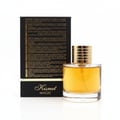 Maison Alhambra Kismet Magic by Maison Alhambra 100ml EDP Unisex — Gold-capped glass perfume bottle with golden liquid, set against a black box with text and the 'Kismet Magic' logo.
