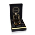 Maison Alhambra Kismet For Men — Rectangular glass perfume bottle with gold accents, presented in an open black gift box with gold trim and black satin lining.