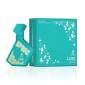 Maison Alhambra Luxe Emerald Perfume Maison Alhambra 100ml Unisex — Teal perfume bottle with gold geometric pattern next to its teal and gold box, both with geometric designs.