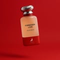 Maison Alhambra Forbidden Love by Maison Alhambra 80ml EDP Women — Botol minyak wangi kaca beku dengan tapak merah dan penutup perak berlubang, berlatar belakang merah terang.