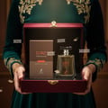 Maison Alhambra Toro Pour Homme Glace by Maison Alhambra – 100 ml for Men, presented in a luxurious red velvet gift box with gold accents, featuring the perfume bottle and its packaging.