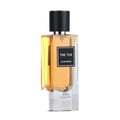 Maison Alhambra The Tux by Maison Alhambra 90ml EDP for Men — Clear glass bottle with amber liquid, black textured cap, and a black label with white text. Deer logo visible at the base.