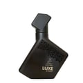 Maison Alhambra Luxe Street — Black matte perfume bottle with a geometric pattern and gold deer logo, angled shot on a white background.