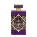 Maison Alhambra Infini Rose — Botol minyak wangi ungu dengan aksen art deco emas dan kolar bertekstur emas.