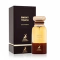 Maison Alhambra Smoky Touch by Maison Alhambra 80ml EDP — A dark brown and gold glass perfume bottle with a textured gold cap, standing next to its matching dark brown box with gold deer logo.